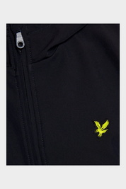 Dettaglio della giacca softshell blu Follower SRL con logo aquila giallo e zip firmata Lyle & Scott