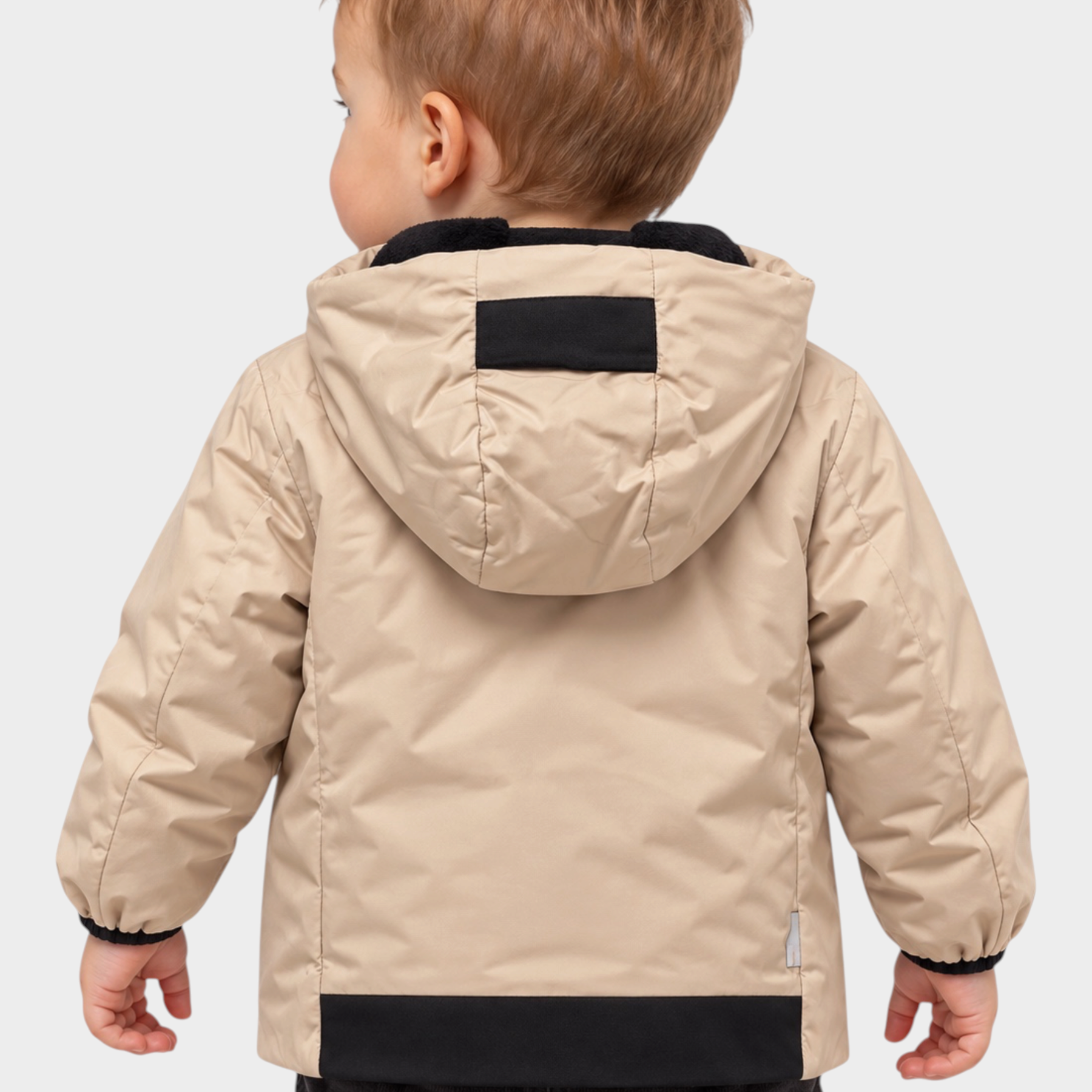 Giubbino Aurelia Follower SRL per bambino in beige con cappuccio e dettagli neri a contrasto, vista posteriore