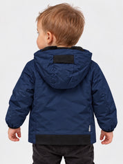 Giubbino Aurelia Velour Bambino Blu SUNS BOARDS di Follower SRL, giacca invernale blu con cappuccio e dettagli neri