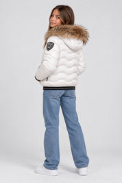 Bambina indossa giubbino bianco trapuntato Blauer con cappuccio bordato in pelliccia, Follower SRL