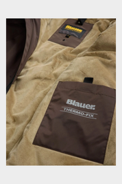 Dettaglio interno del giubbino Follower SRL Blauer marrone con fodera in morbida pelliccia sintetica e tasca Thermo-Fix