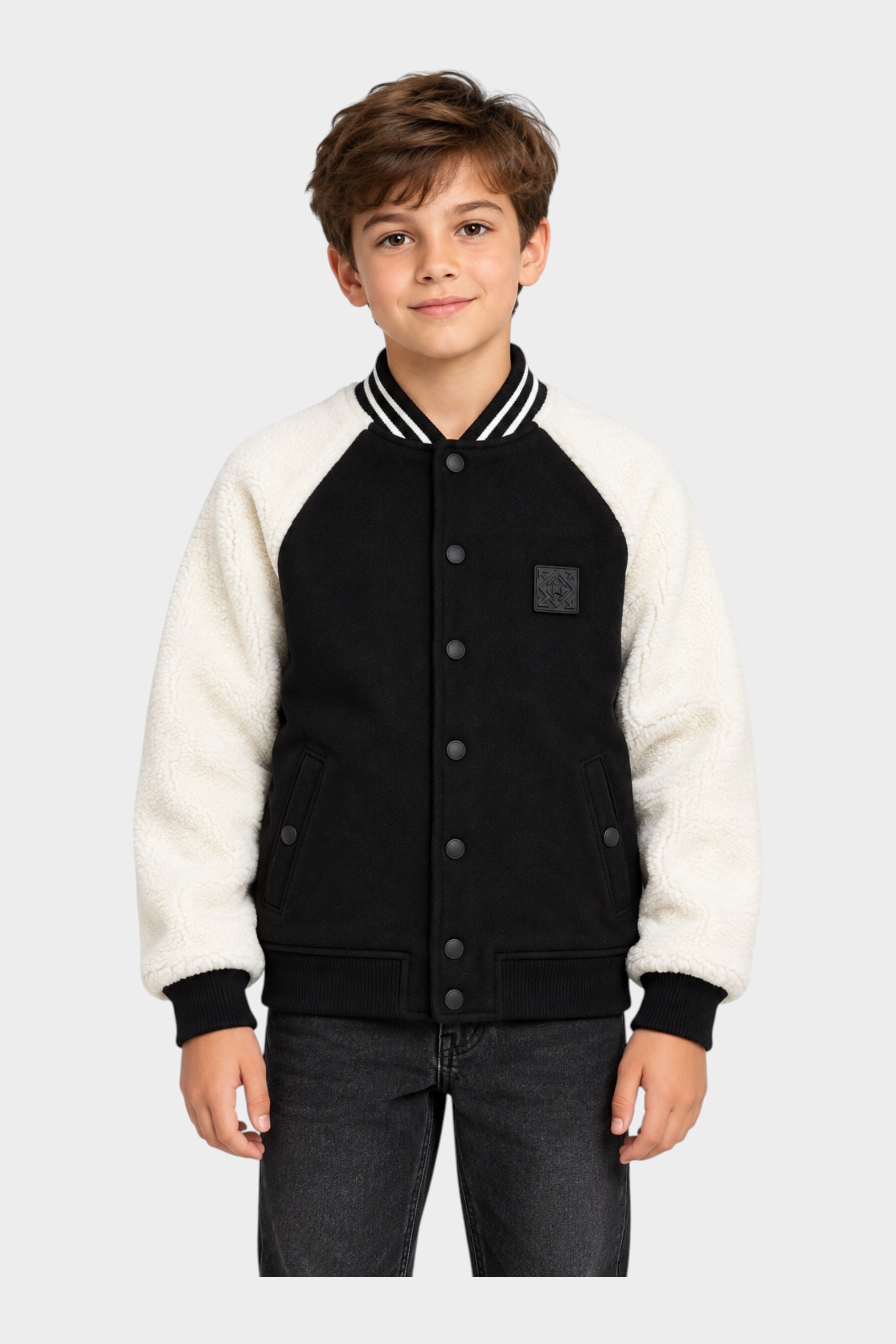 Giubbino bomber Follower SRL nero e bianco per bambino con maniche in tessuto teddy e chiusura a bottoni