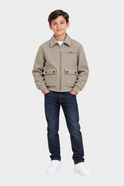 Ragazzo indossa giubbino bomber beige Follower SRL in lana con tasche frontali e logo Richmond sul petto