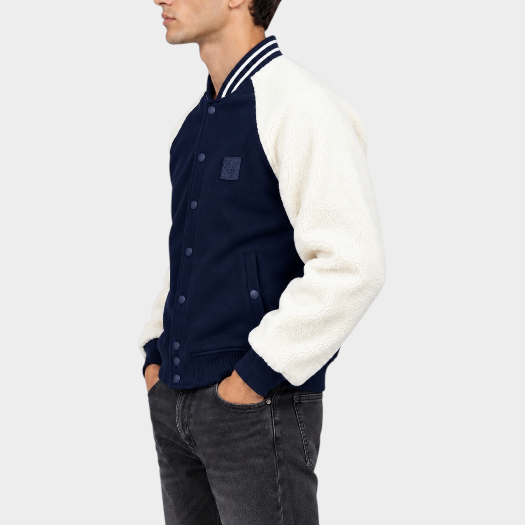 Giubbino bomber Follower SRL blu con maniche in sherpa bianco, modello indossato di profilo