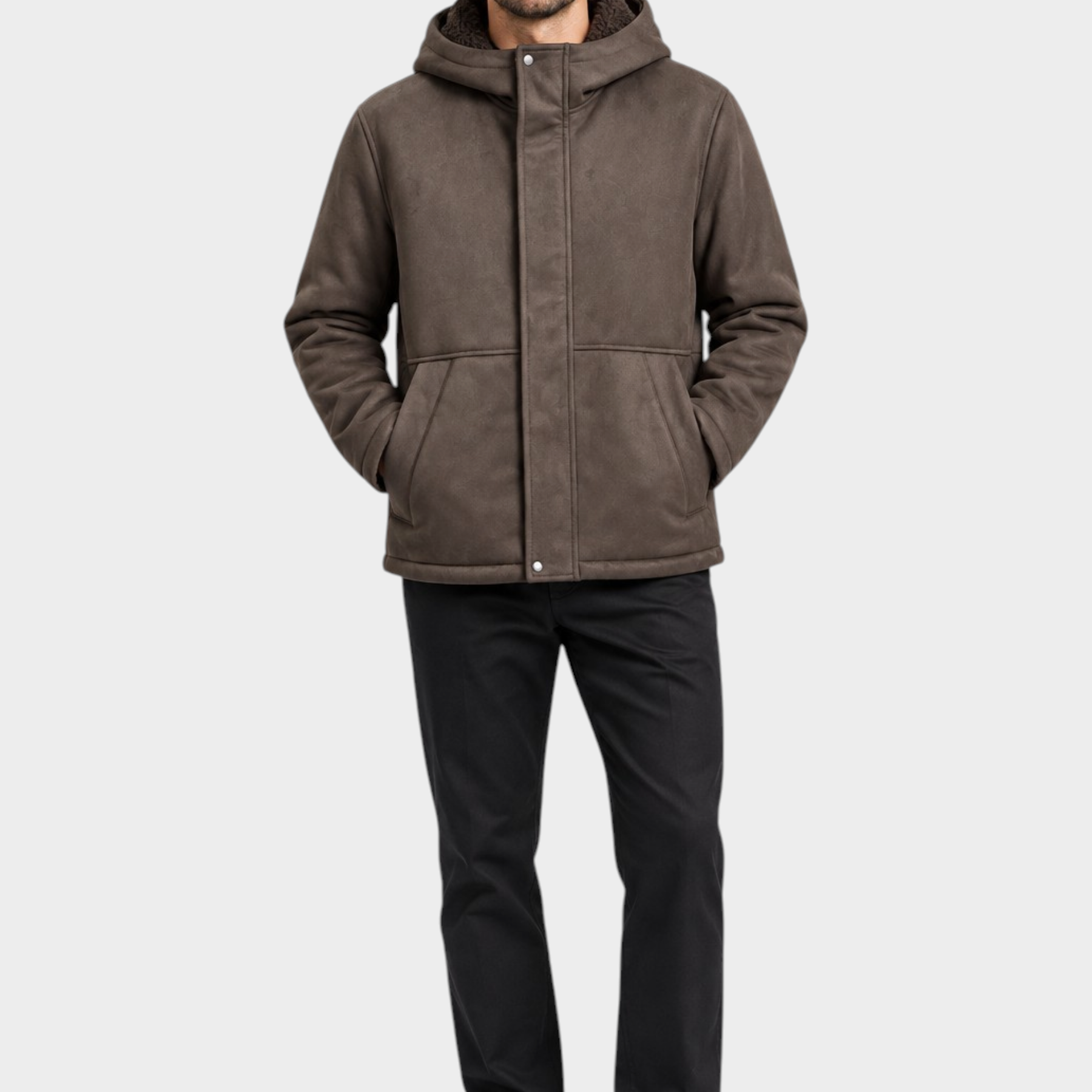 Modello indossa giubbino bomber in montone marrone con cappuccio di Follower SRL, stile casual invernale.