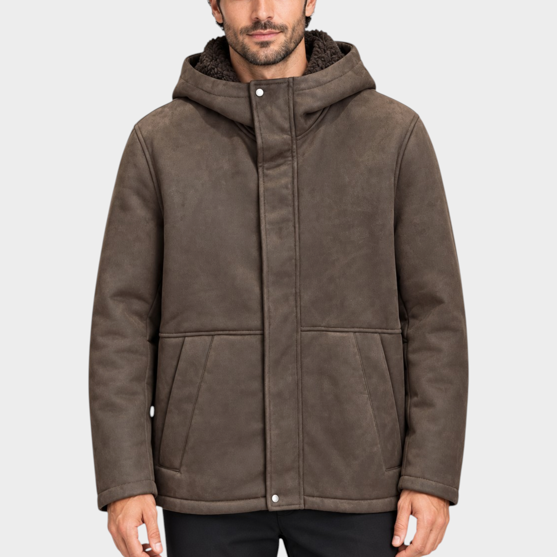 Modello indossa giubbino bomber in montone marrone con cappuccio e interno in pelliccia Follower SRL
