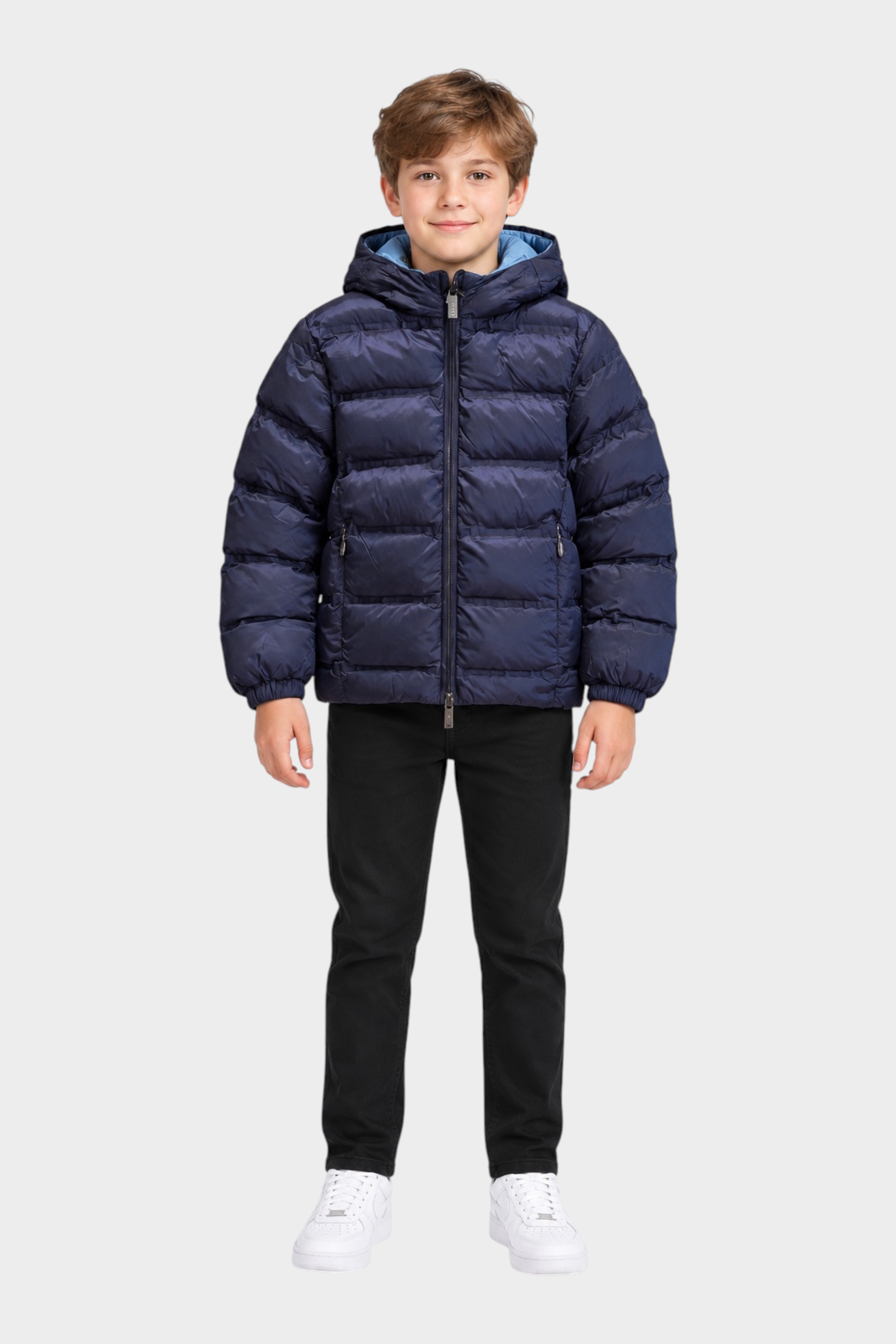 Ragazzo indossa giubbino reversibile Follower SRL blu scuro con cappuccio e interno azzurro