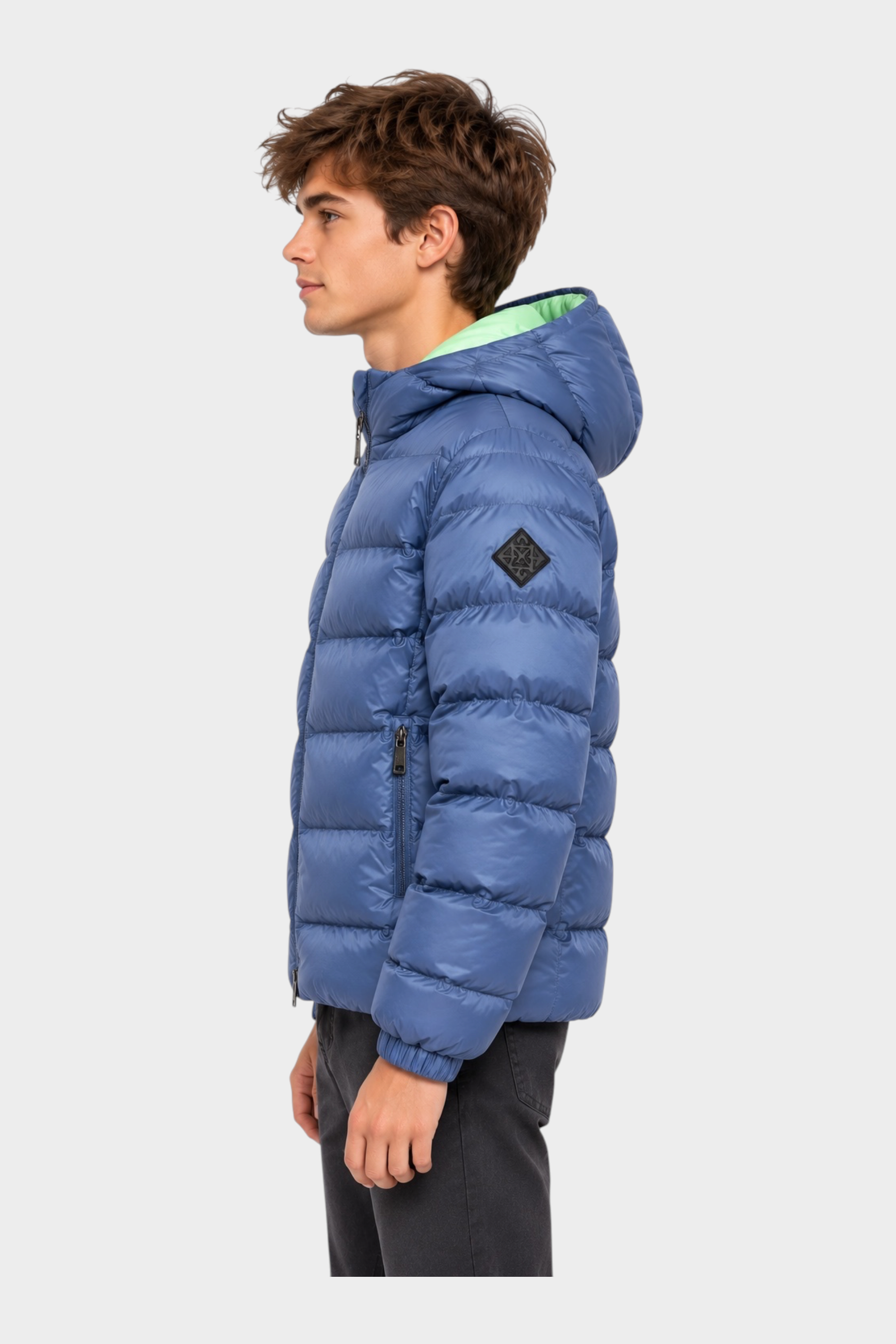 Giubbino reversibile unisex Follower SRL blu trapuntato con cappuccio e interno verde chiaro indossato di profilo
