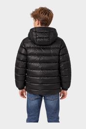 Ragazzo di spalle indossa un giubbino reversibile nero con cappuccio Follower SRL, vista posteriore