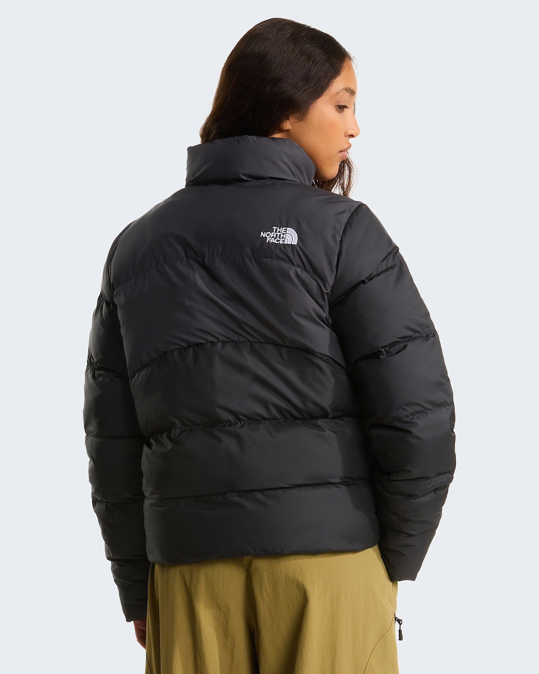 Modella indossa giubbino imbottito nero The North Face Saikuru da donna, vista posteriore, Follower SRL