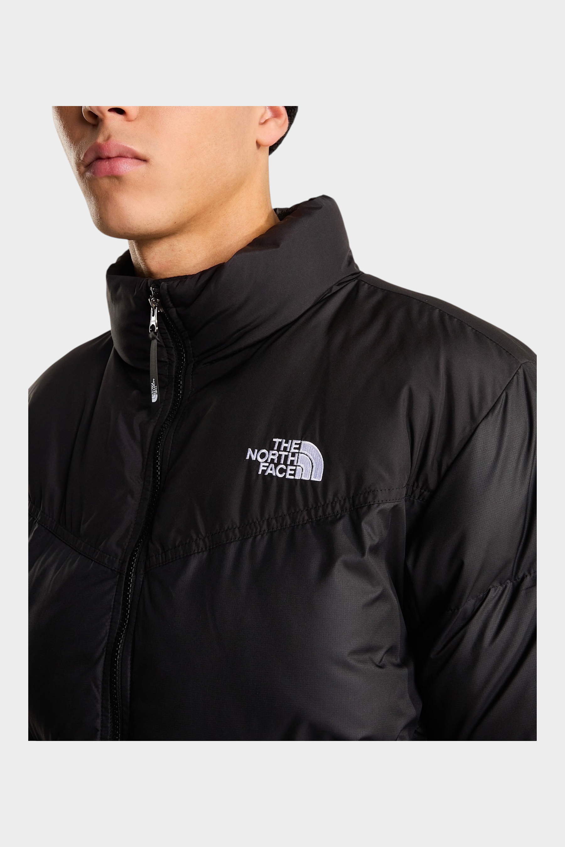 Giubbino nero da uomo Saikuru WindWall di Follower SRL con logo The North Face ricamato sul petto e collo alto