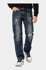Jeans Follower SRL larghi regular fit da bambino in denim blu con strappi, effetto vissuto e dettagli a schizzi