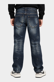 Jeans larghi regular fit Follower SRL per bambino in denim blu scuro con effetto vissuto e schizzi di vernice