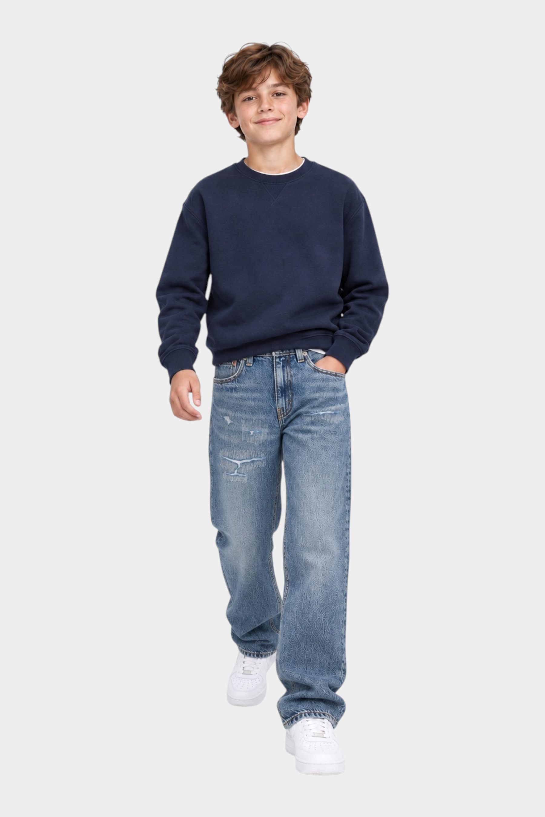 Jeans Follower SRL barrel fit per bambino in denim blu con effetto vintage indossati da un ragazzo con felpa scura