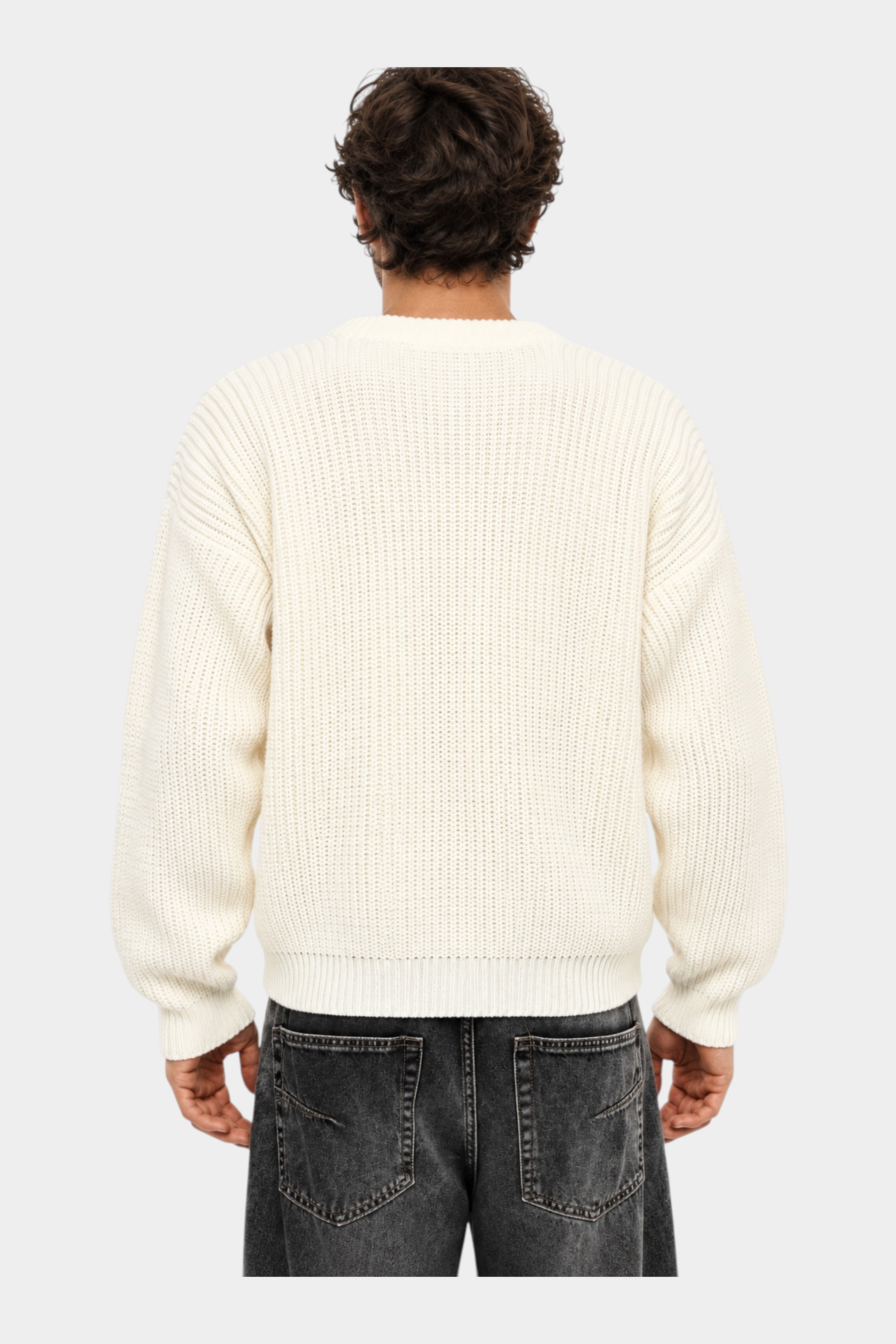 Vista posteriore di un uomo che indossa un maglione girocollo Follower SRL beige a maglia larga regular-fit