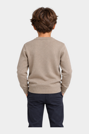 Vista posteriore di un bambino che indossa un maglione girocollo beige Follower SRL con polsini a coste