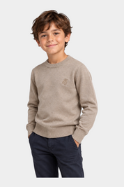 Bambino indossa un maglione girocollo beige Follower SRL con logo iconico ricamato sul petto