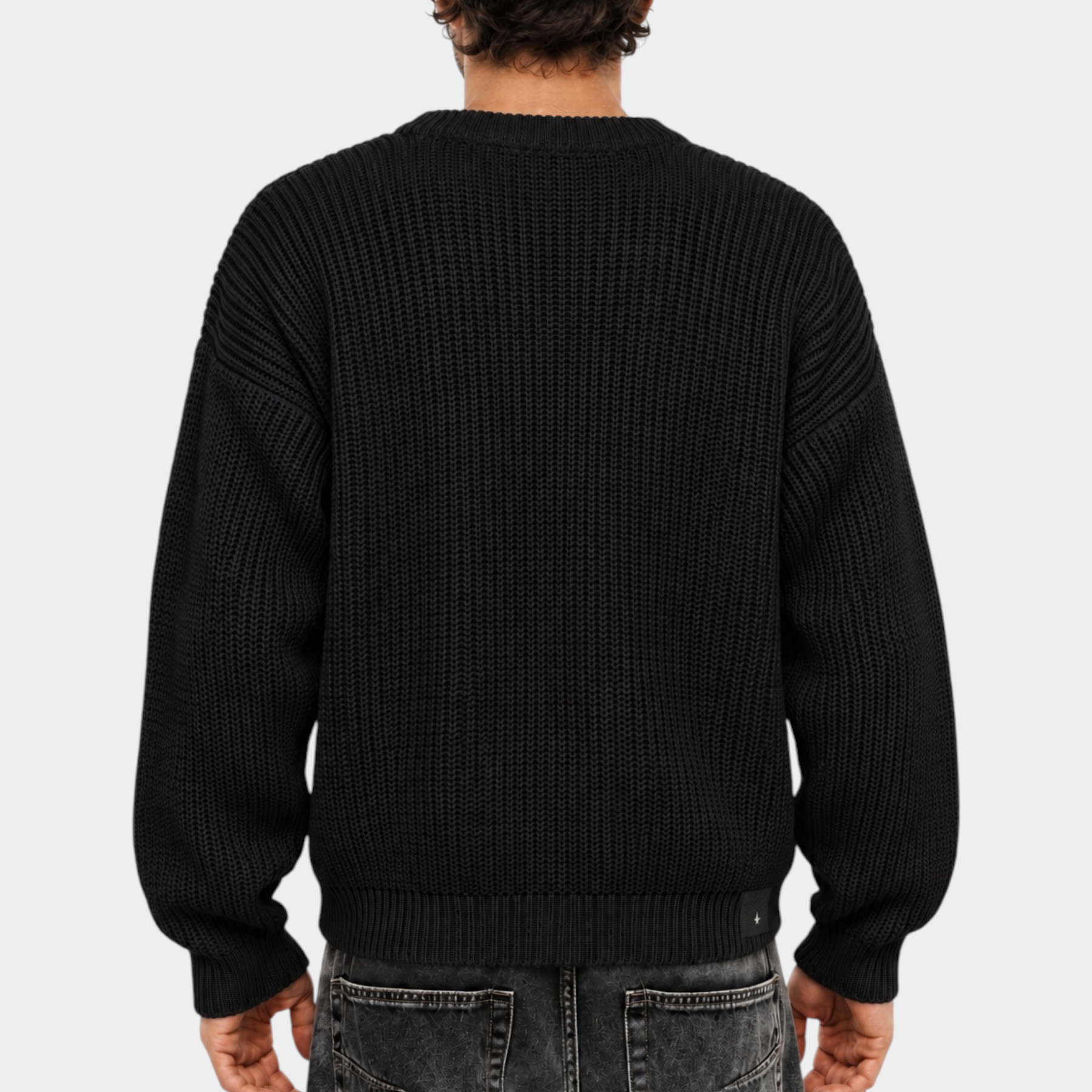 Vista posteriore di un uomo che indossa un maglione girocollo nero a maglia larga Follower SRL regular-fit