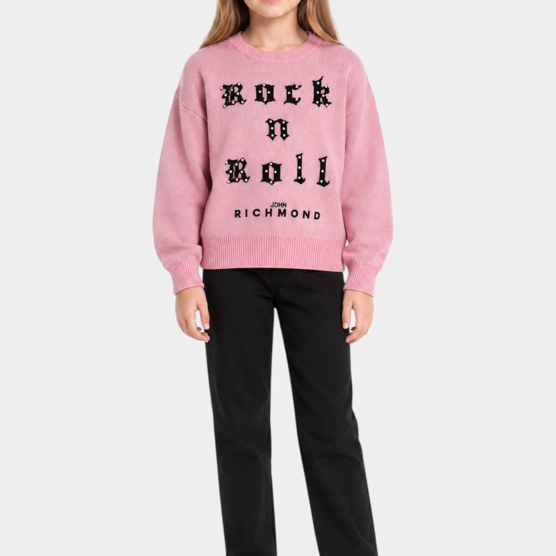 Bambina che indossa un maglione girocollo rosa Follower SRL con scritta Rock n Roll decorata da strass neri