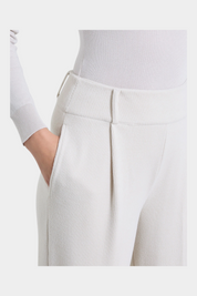 Pantalone a carota Follower SRL in velluto avorio con pinces e tasche laterali