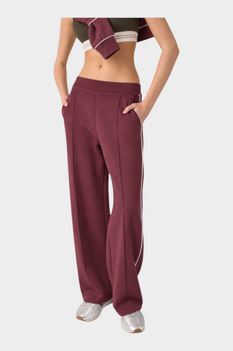 Pantalone jogger donna Follower SRL color bordeaux con linea laterale a contrasto e logo GUESS ricamato