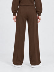 Pantalone jogger marrone GUESS da donna con gamba dritta e cucitura centrale, proposto da Follower SRL