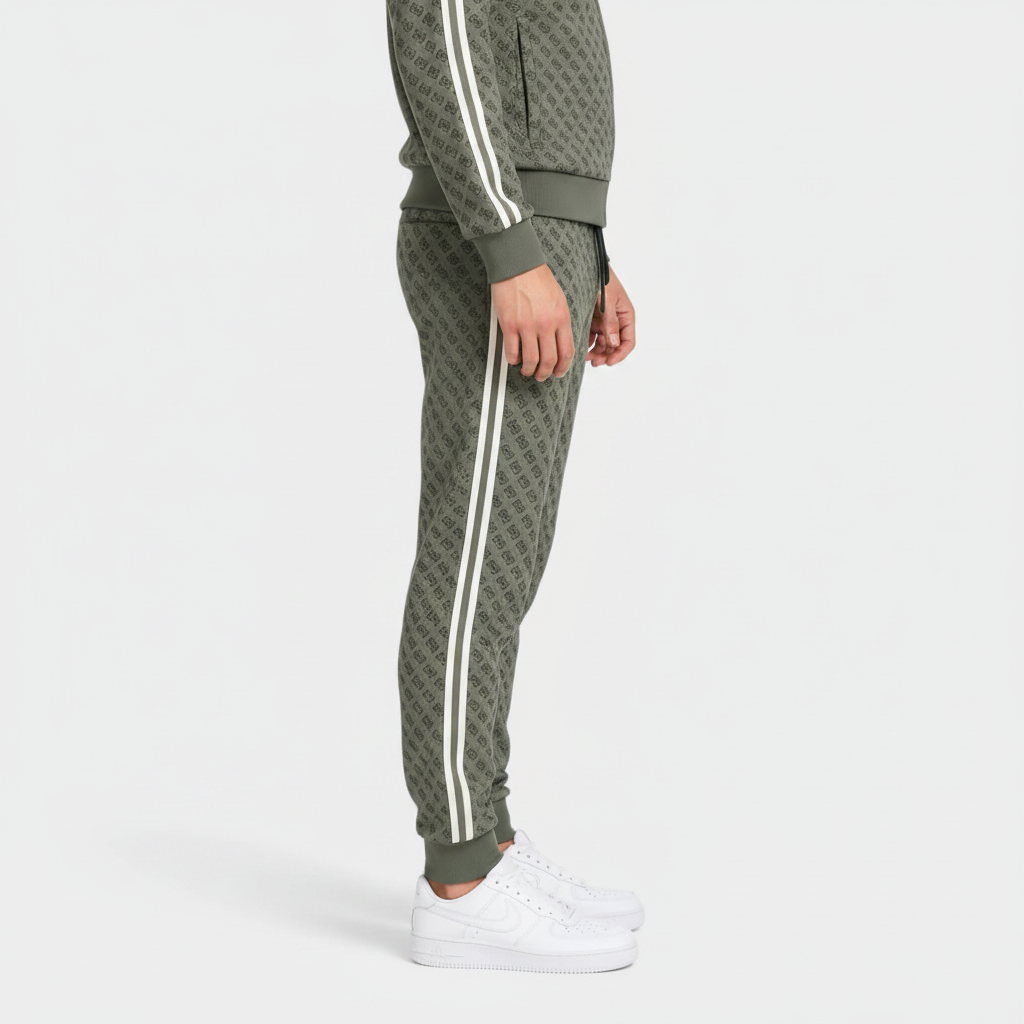 Pantalone jogger Follower SRL GUESS verde con stampa logo all-over e bande laterali bianche a contrasto