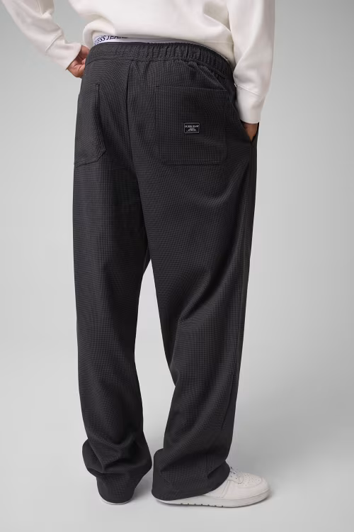 Pantalone a gamba larga Follower SRL da uomo in grigio con motivo micro-check, vita elasticizzata e tasche posteriori