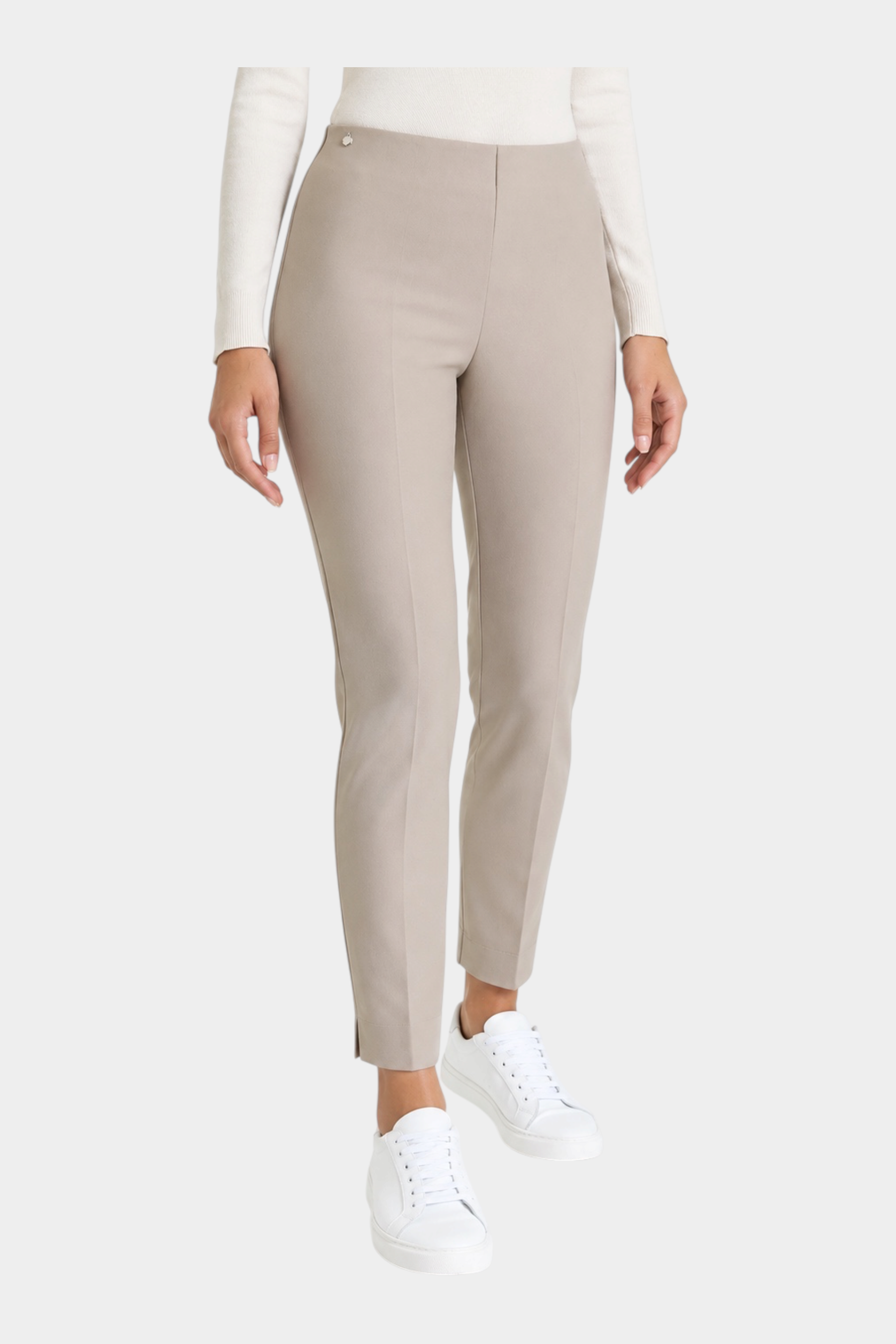 Pantalone a sigaretta Follower SRL color beige in tessuto compact con spacchetti laterali indossato da una modella