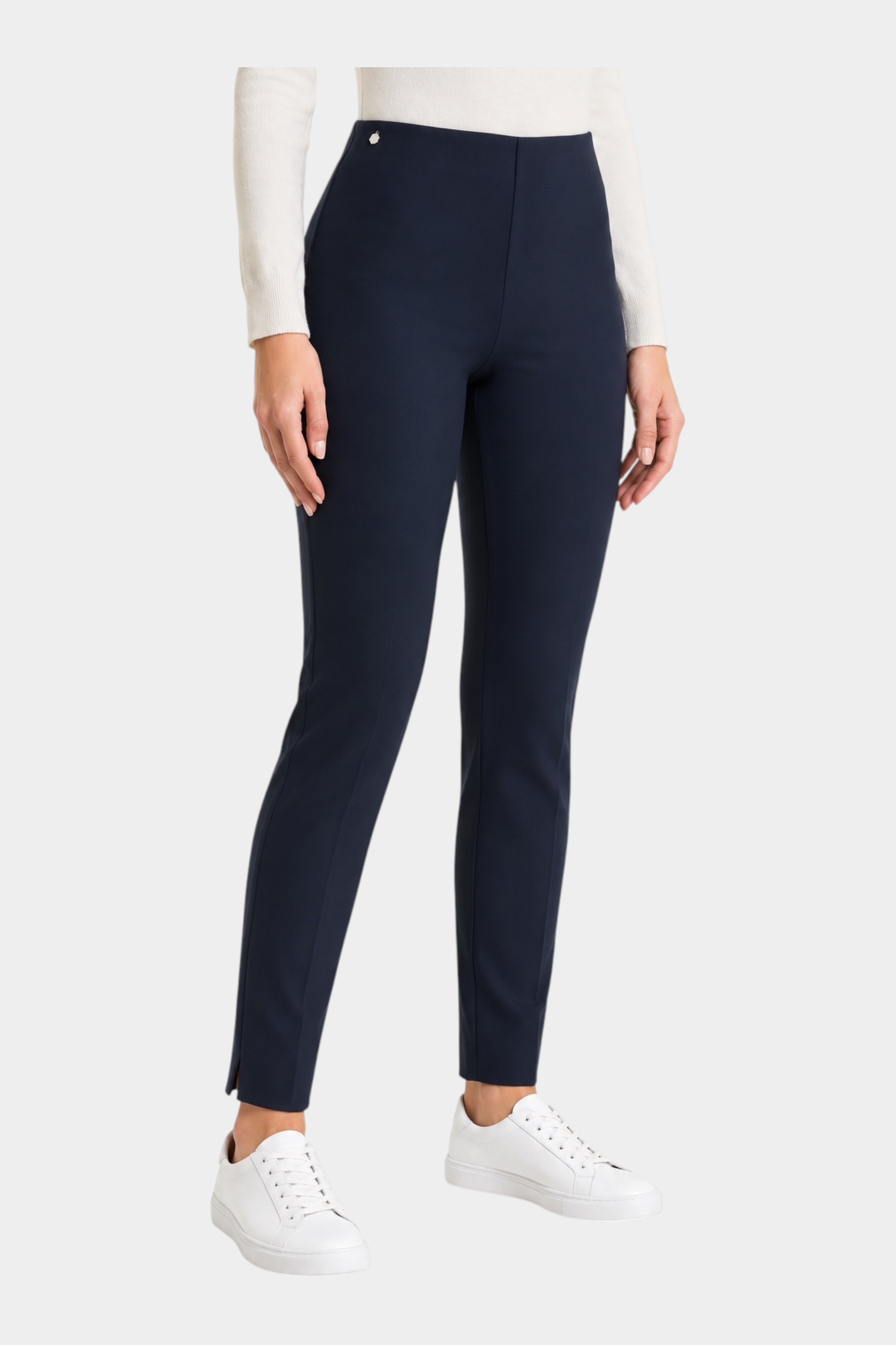 Pantalone a sigaretta blu Follower SRL in tessuto compact con spacchetti laterali indossato con sneakers bianche