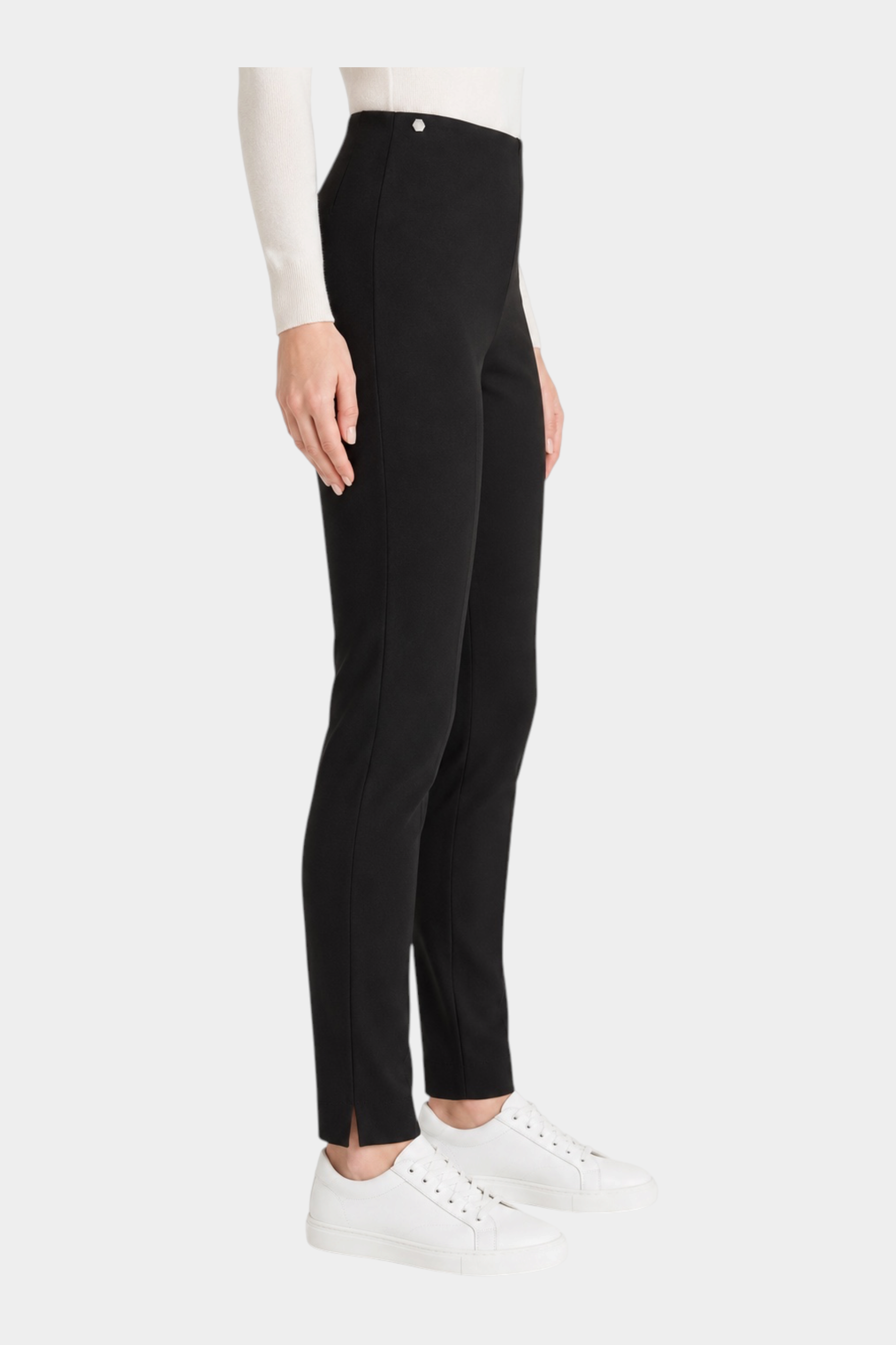 Pantalone a sigaretta nero Follower SRL in tessuto compact con spacchetti laterali indossato di profilo