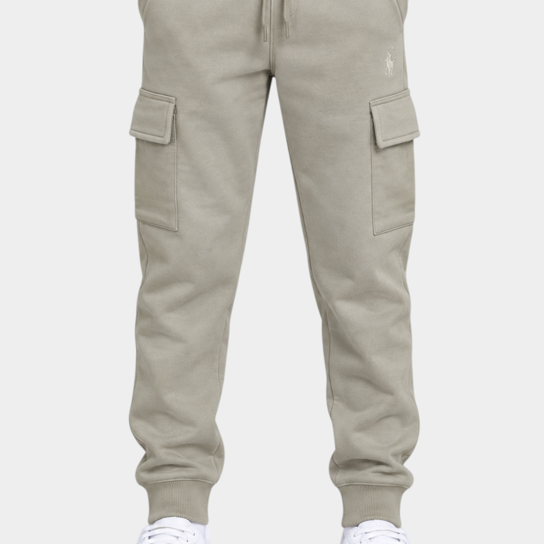 Pantaloni cargo beige Follower SRL in cotone con tasche laterali e polsini elasticizzati indossati da un bambino