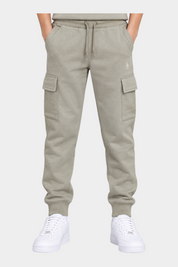 Pantaloni cargo beige Follower SRL in cotone con tasche laterali e polsini elasticizzati indossati da un bambino