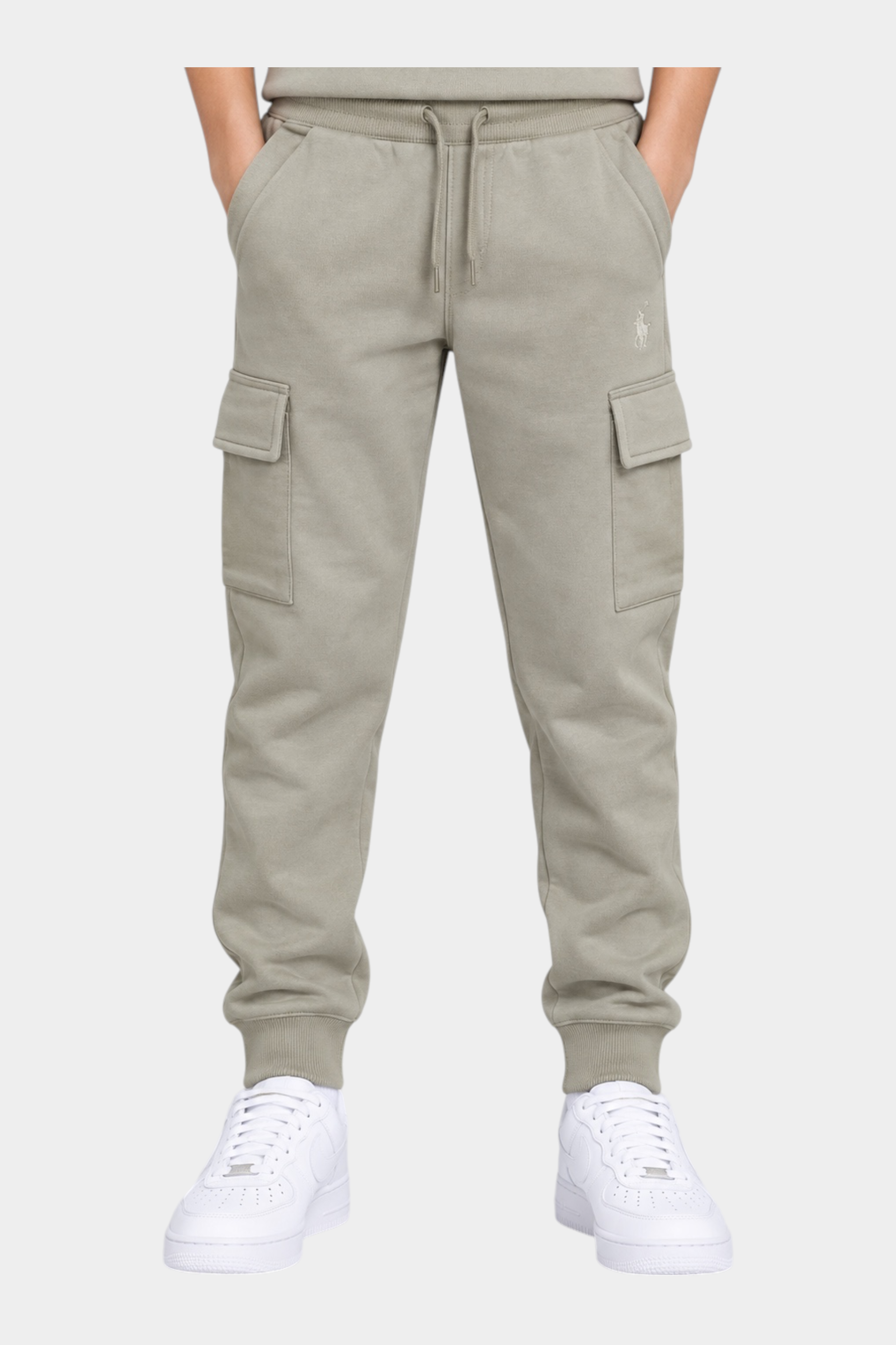 Pantaloni cargo beige Follower SRL in cotone con tasche laterali e polsini elasticizzati indossati da un bambino