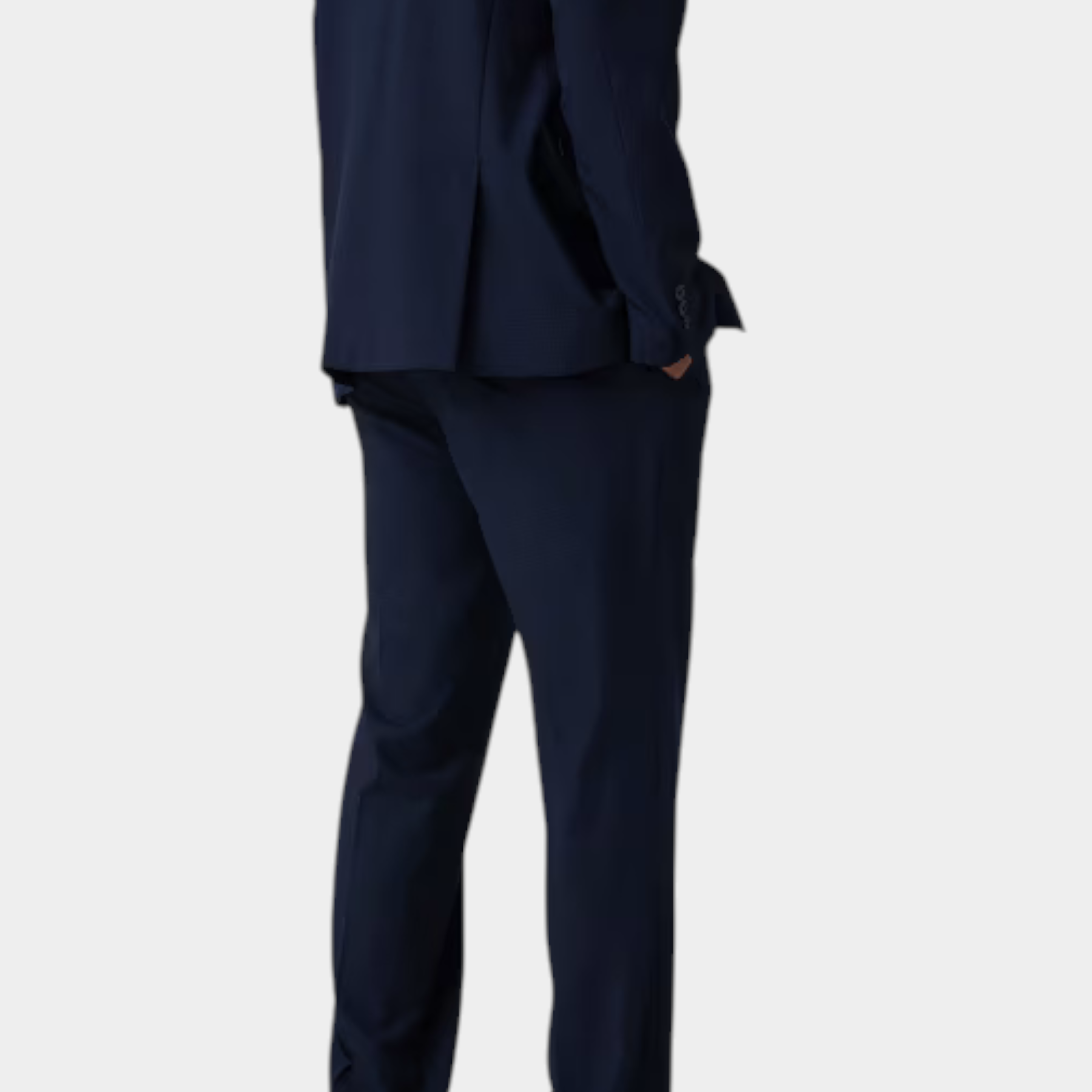 Pantaloni classici da uomo blu GUESS indossati con giacca abbinata, vista posteriore, proposti da Follower SRL