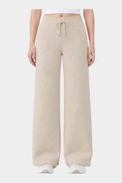 Pantaloni jogger Follower SRL color ecru con motivo logo 4G in rilievo e vestibilità ampia