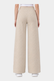 Pantaloni jogger Follower SRL color ecru a gamba larga con motivo logo 4G in rilievo su tutta la superficie