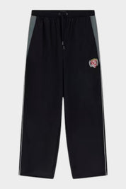 Pantaloni jogger Follower SRL GUESS in nylon nero con inserti grigi, profili bianchi e stemma Limited Edition
