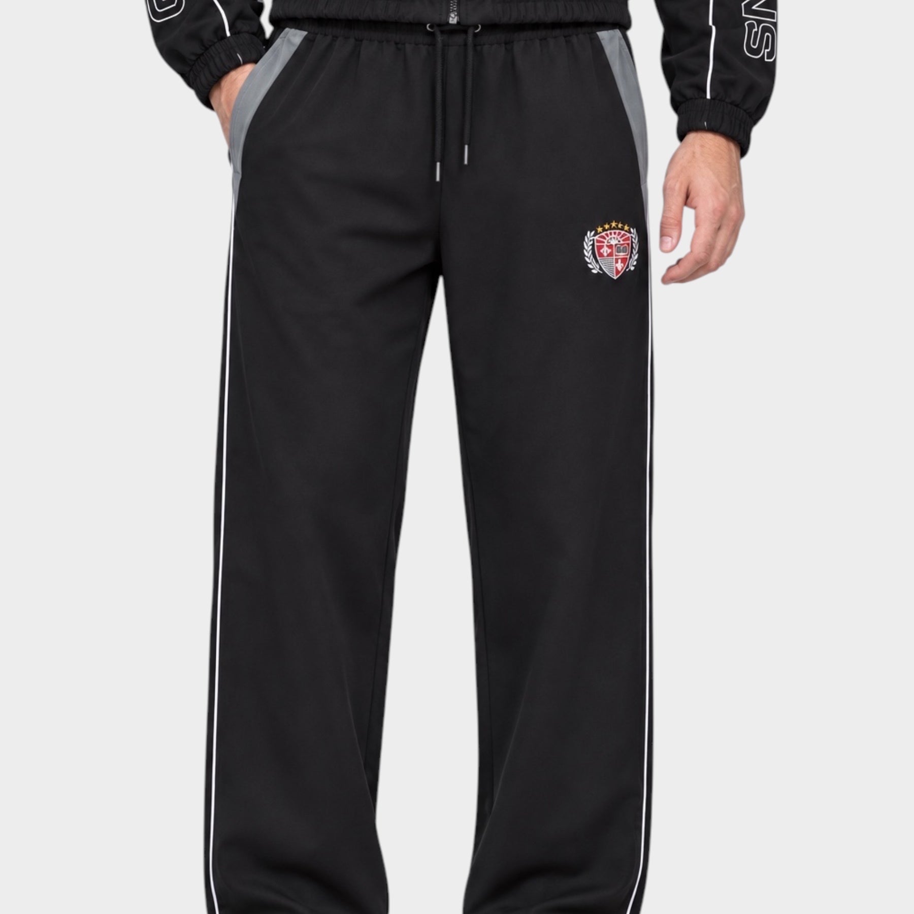 Pantaloni jogger Follower SRL GUESS neri in nylon con profili bianchi, inserti grigi e stemma applicato