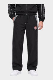 Pantaloni jogger Follower SRL GUESS neri in nylon con profili bianchi, inserti grigi e stemma applicato