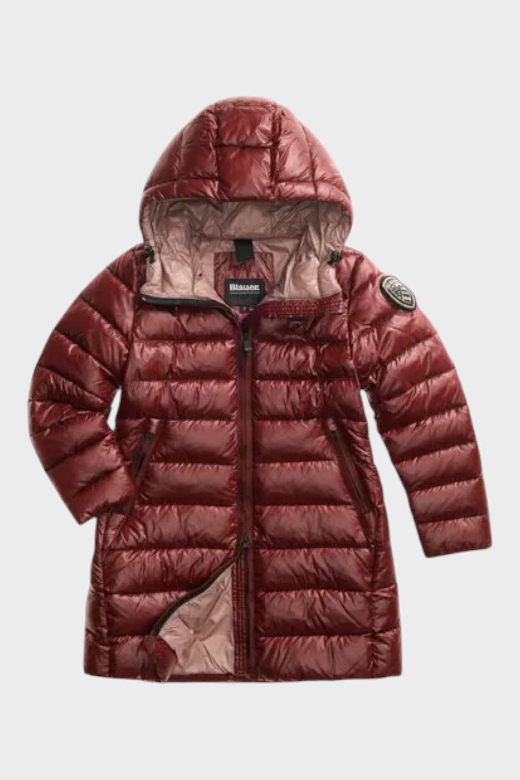 Piumino lungo Follower SRL Blauer per bambina, color marrone lucido, trapuntato con cappuccio e logo sulla manica.