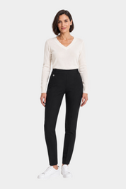 Follower SRL RAGNO women's black cigarette trousers with belt loops, styled with a white V-neck sweater and sneakers.