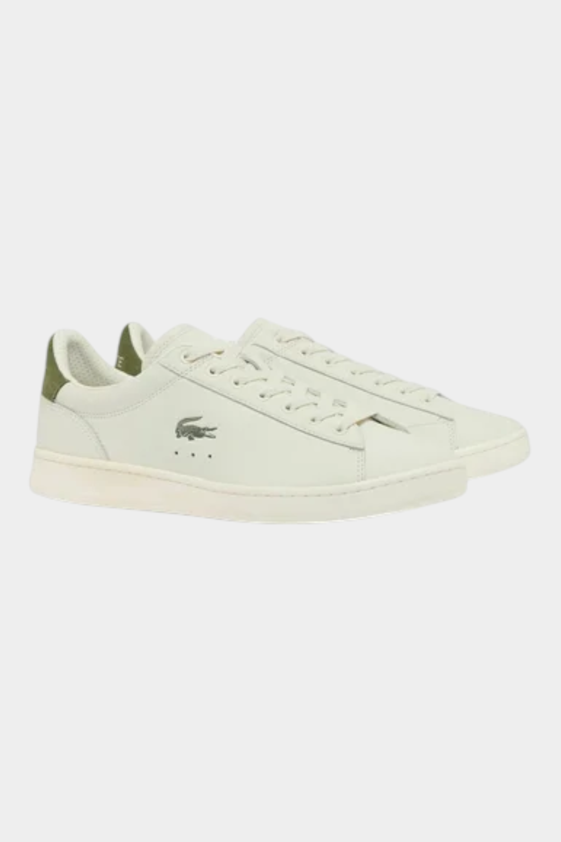 Sneakers Lacoste Carnaby da uomo in pelle bianca con dettagli verdi e logo laterale, vendute da Follower SRL
