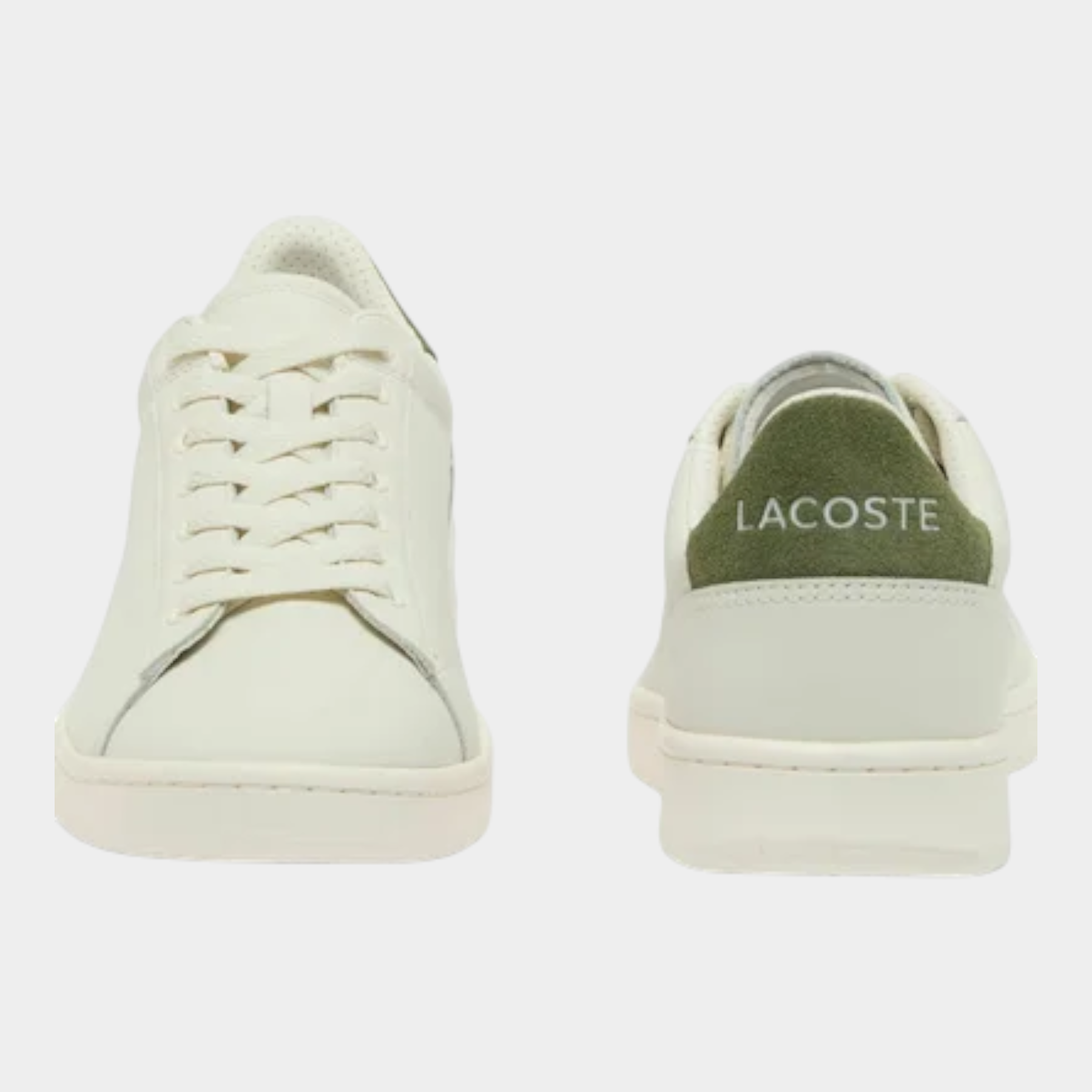 Sneakers Lacoste Carnaby da uomo in pelle bianca con dettaglio verde sul tallone, vendute da Follower SRL