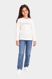 Bambina che indossa una t-shirt bianca a maniche lunghe Follower SRL con logo US GRAND POLO decorato con strass