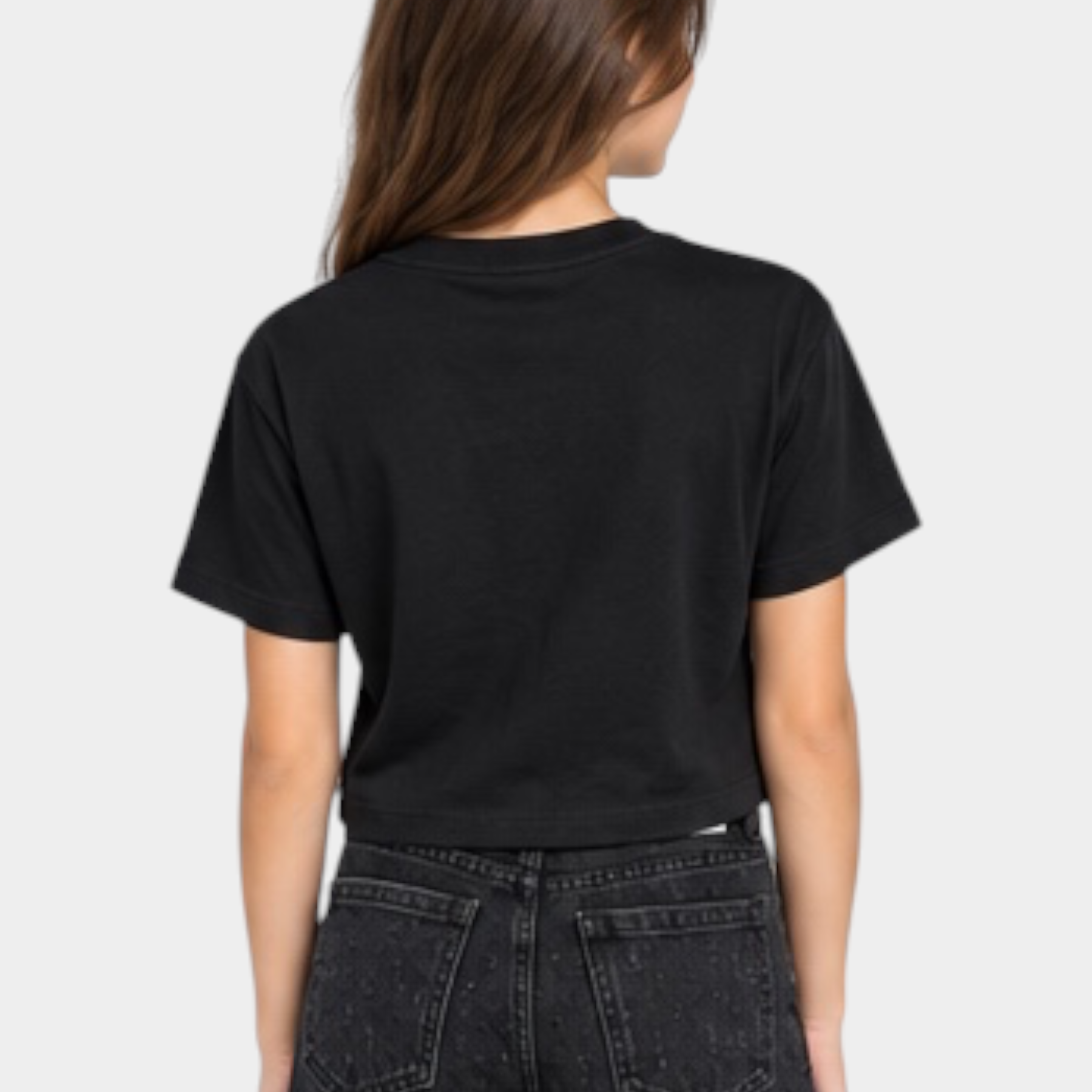 Bambina indossa T-shirt crop nera Follower SRL con taglio corto e vestibilità comoda vista da dietro