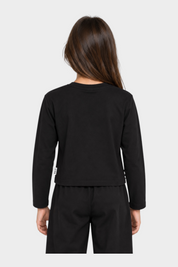 Vista posteriore di una t-shirt boxy nera a maniche lunghe Follower SRL con etichetta ICON, indossata da una bambina