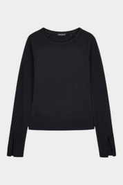 Top nero a maniche lunghe GUESS con dettagli in pizzo sui polsini, proposto da Follower SRL