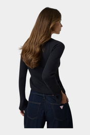 Top nero a maniche lunghe in pizzo di Follower SRL indossato da una modella di spalle con jeans scuri