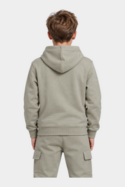 Ragazzo indossa felpa con cappuccio e pantaloni cargo beige Follower SRL, vista posteriore